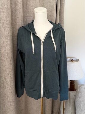 Vuori dark teal zip-up hoodie with cream drawstrings
